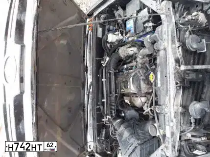 Фото автомобиля KIA RIO, 2012 — госномер Т951ХТ86. Цвет: Серебристый