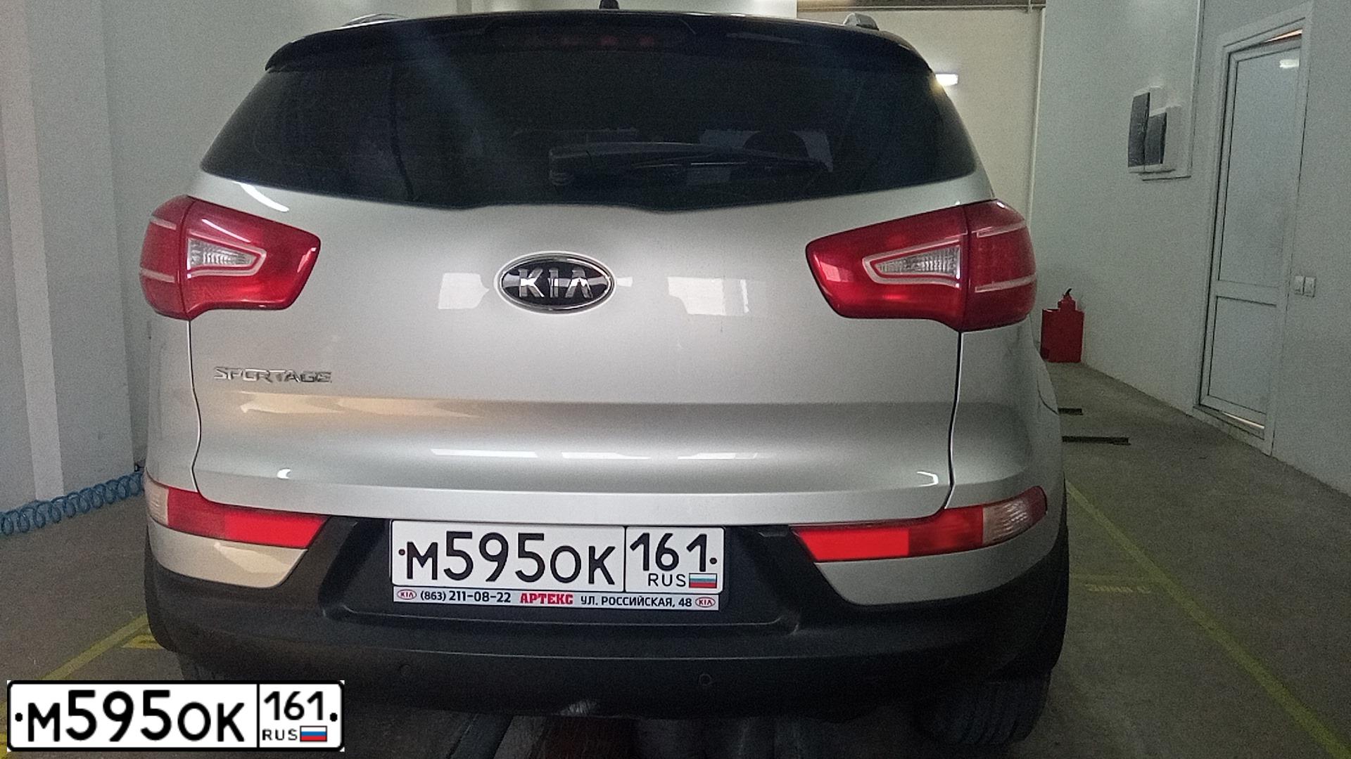 Фото автомобиля KIA SPORTAGE, 2012 — госномер М595ОК161. Цвет: ПЕРЛАМ.-СЕРЕБРИСТЫЙ