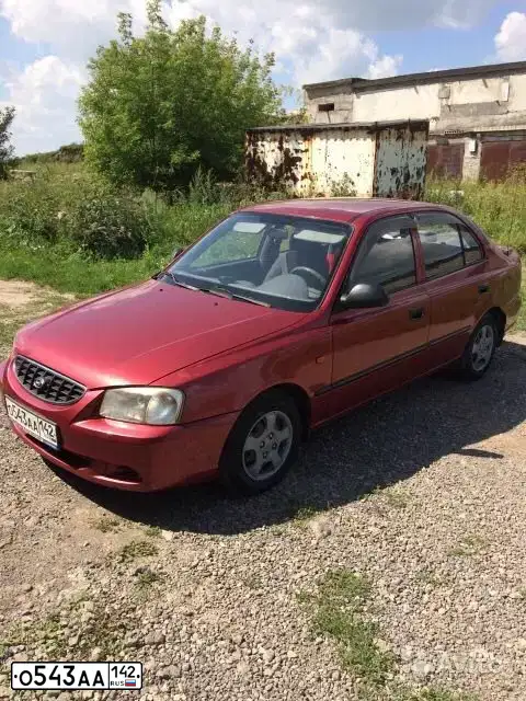 Фото автомобиля TAGAZ ACCENT, 2005 — госномер О543АА142. Цвет: Красный