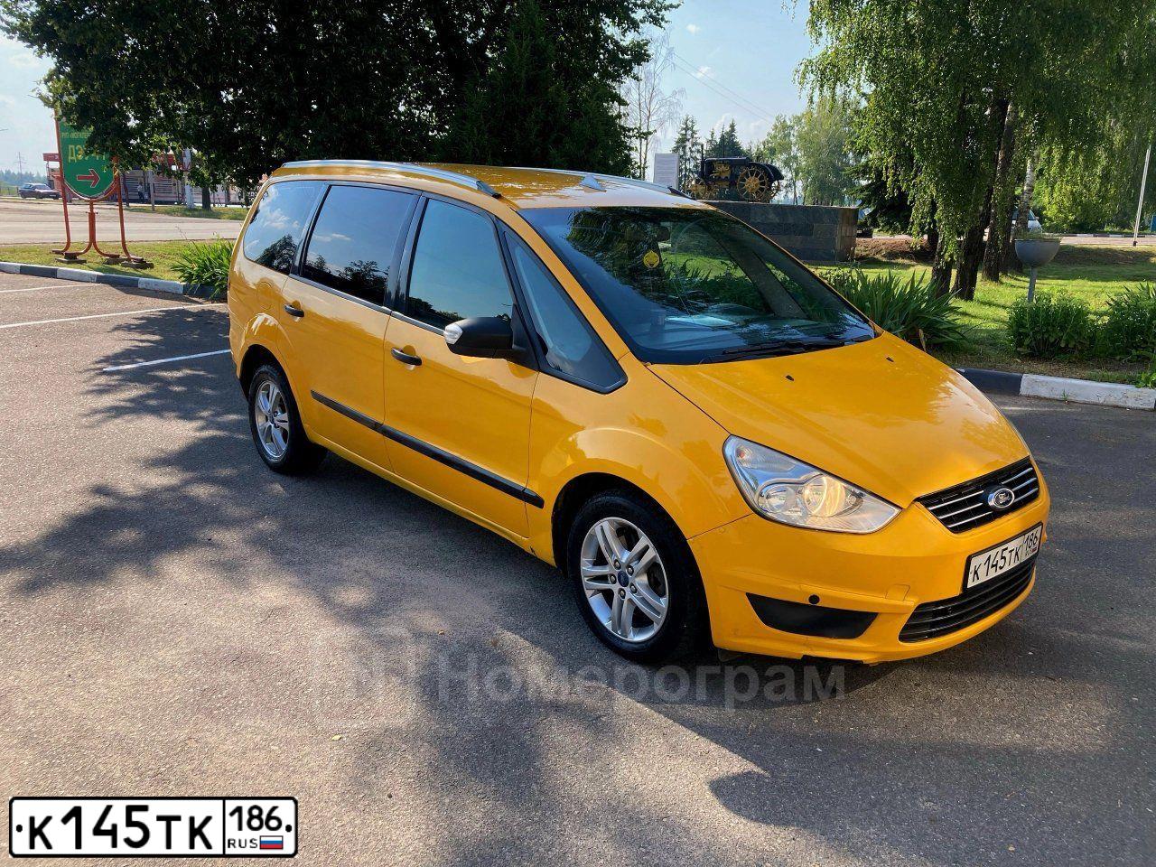Фото автомобиля FORD GALAXY, 2014 — госномер К145ТК186. Цвет: БЕЛЫЙ-ЖЕЛТЫЙ-СЕРЫЙ