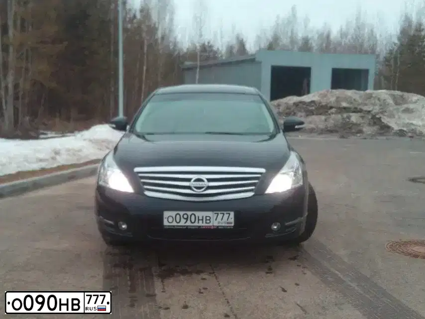 Фото автомобиля NISSAN TEANA, 2010 — госномер У909КН152. Цвет: ЧЕРНЫЙ