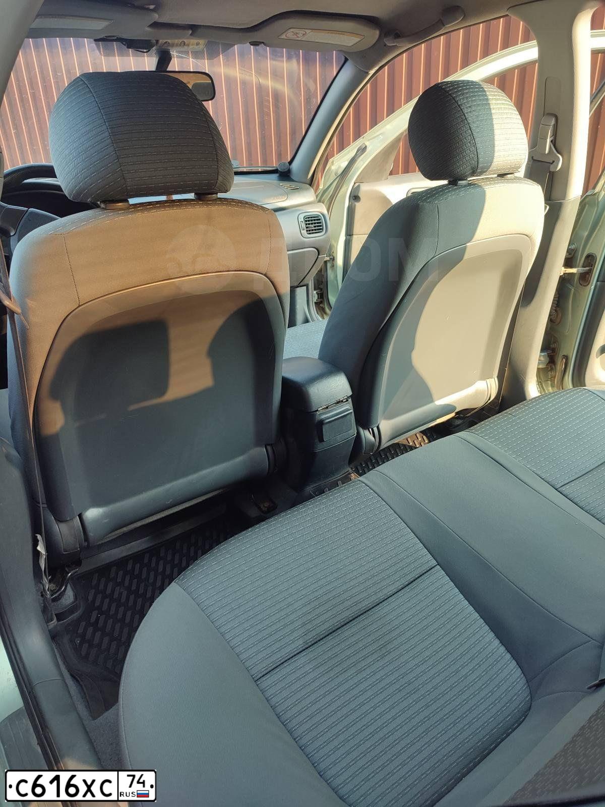 Фото автомобиля LADA 2110 LADA, 2003 — госномер С616ХС74. Цвет: Темно-зеленый