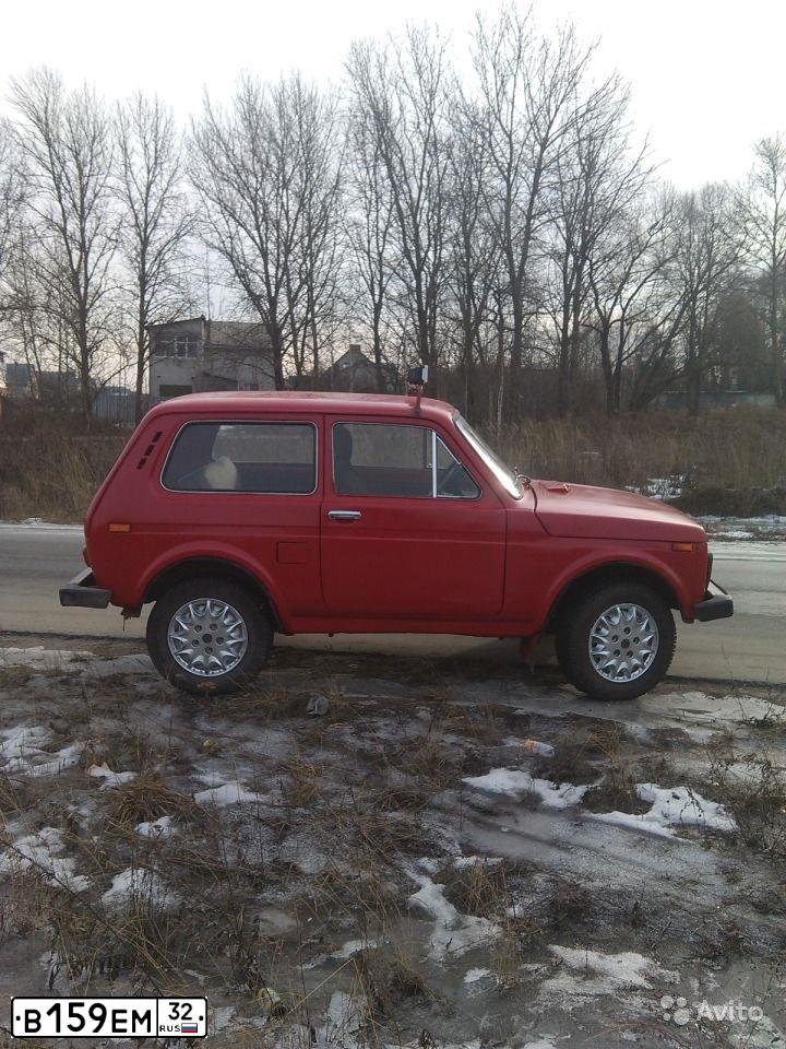 Фото автомобиля LADA 2121 NIVA, 1990 — госномер В159ЕМ32. Цвет: КРАСНЫЙ