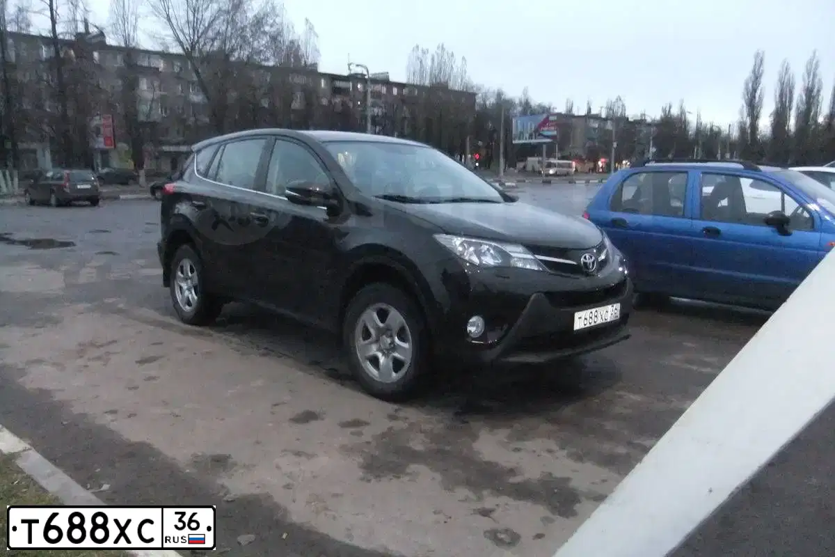 Фото автомобиля TOYOTA RAV4, 2014 — госномер Т688ХС36. Цвет: ТЕМНО-КОРИЧНЕВЫЙ