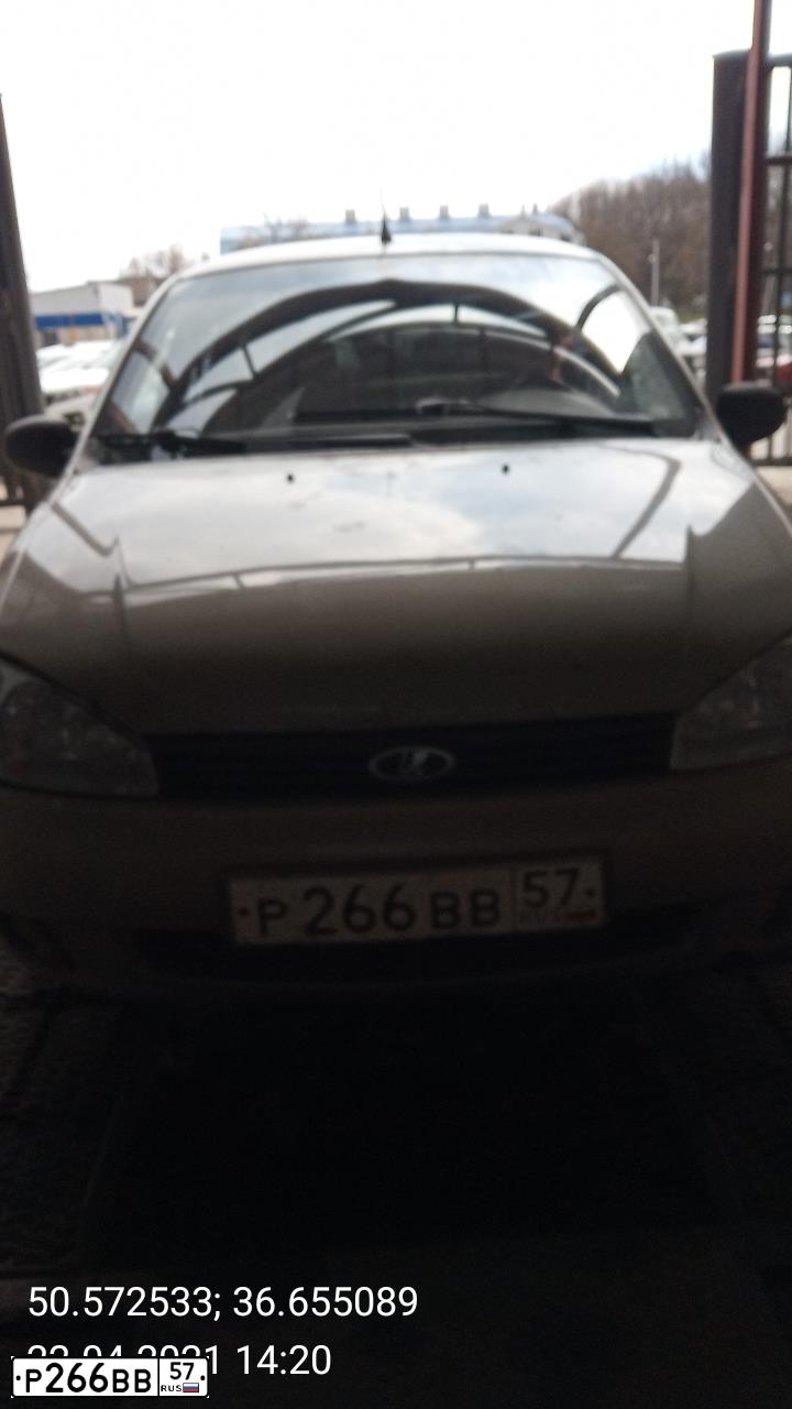 Фото автомобиля LADA 1118 KALINA, 2005 — госномер О050КВ136. Цвет: БЕЖЕВО-СЕРЫЙ
