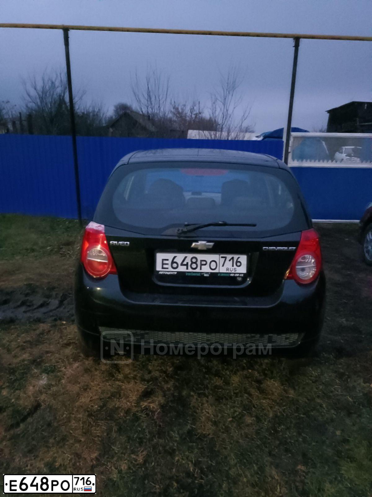 Фото автомобиля CHEVROLET AVEO, 2009 — госномер Е648РО716. Цвет: ЧЕРНЫЙ