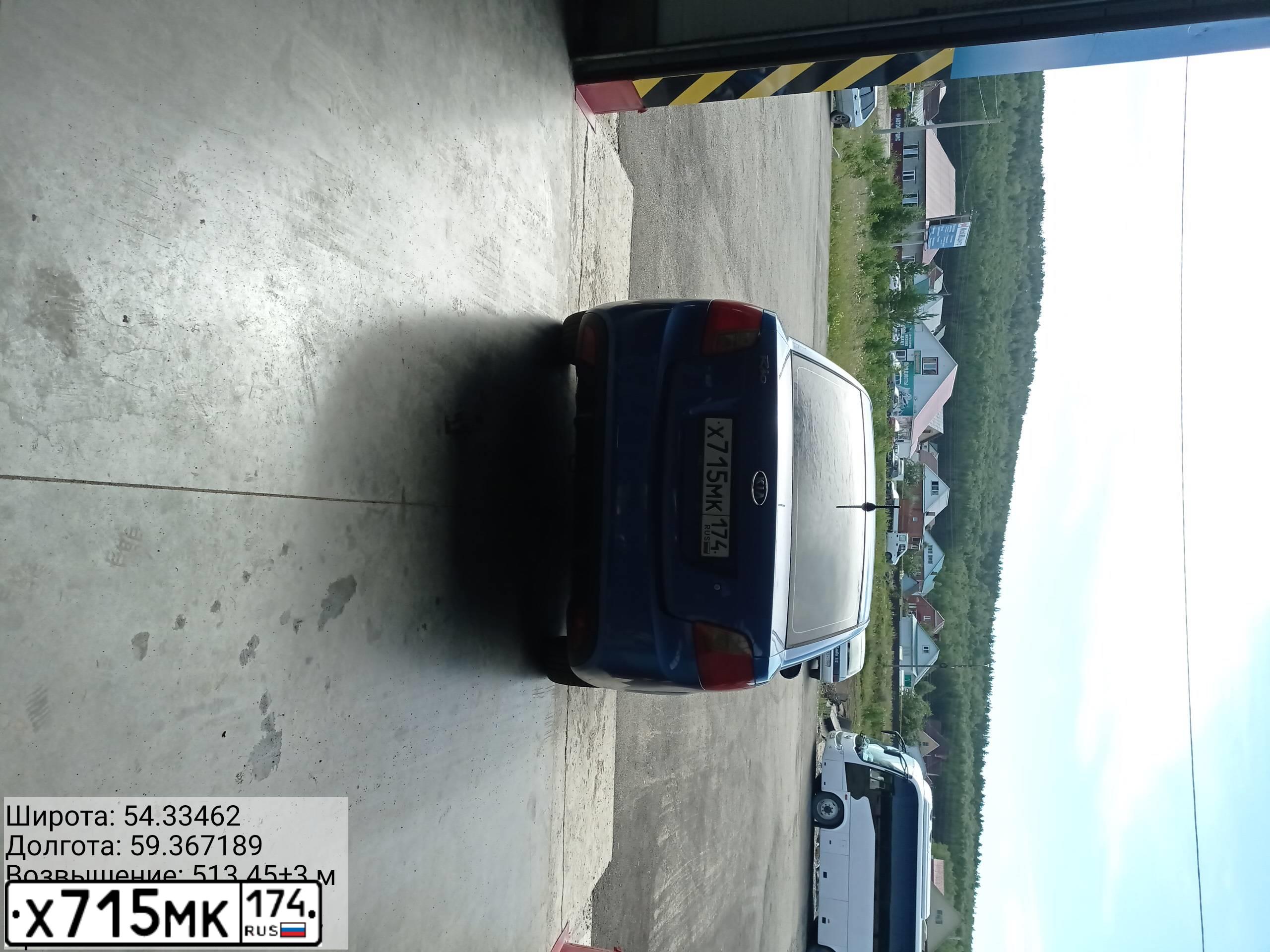 Фото автомобиля KIA RIO, 2009 — госномер В681КТ702. Цвет: синий