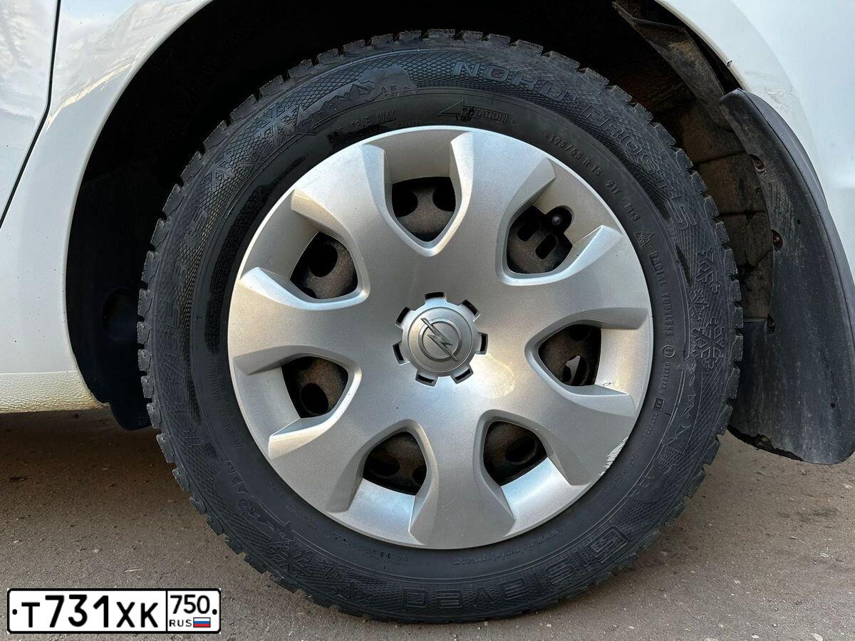 Фото автомобиля OPEL ASTRA, 2012 — госномер Х693НР56. Цвет: СЕРЕБРИСТЫЙ МЕТАЛЛИК