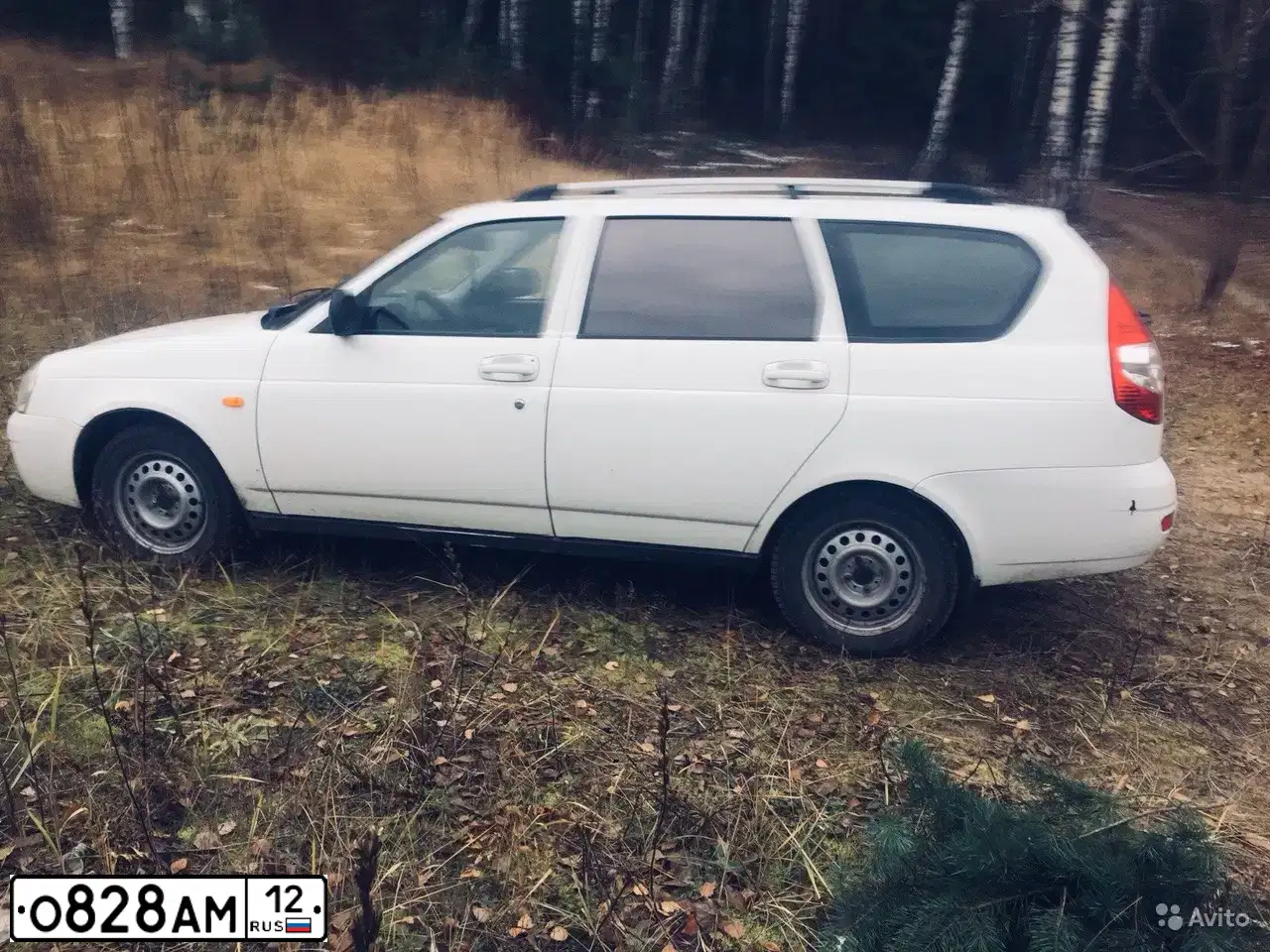 Фото автомобиля LADA 2171 PRIORA, 2009 — госномер К242МТ174. Цвет: ЧЕРНЫЙ