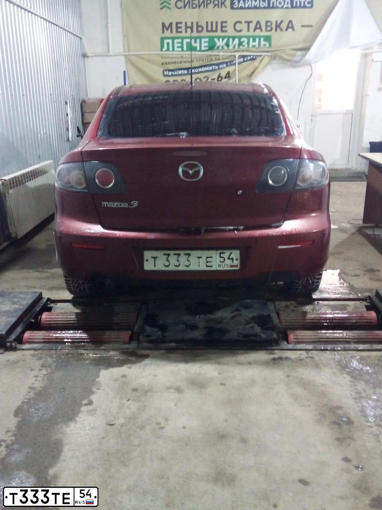 Фото автомобиля MAZDA 3, 2008 — госномер Т333ТЕ54. Цвет: Красный