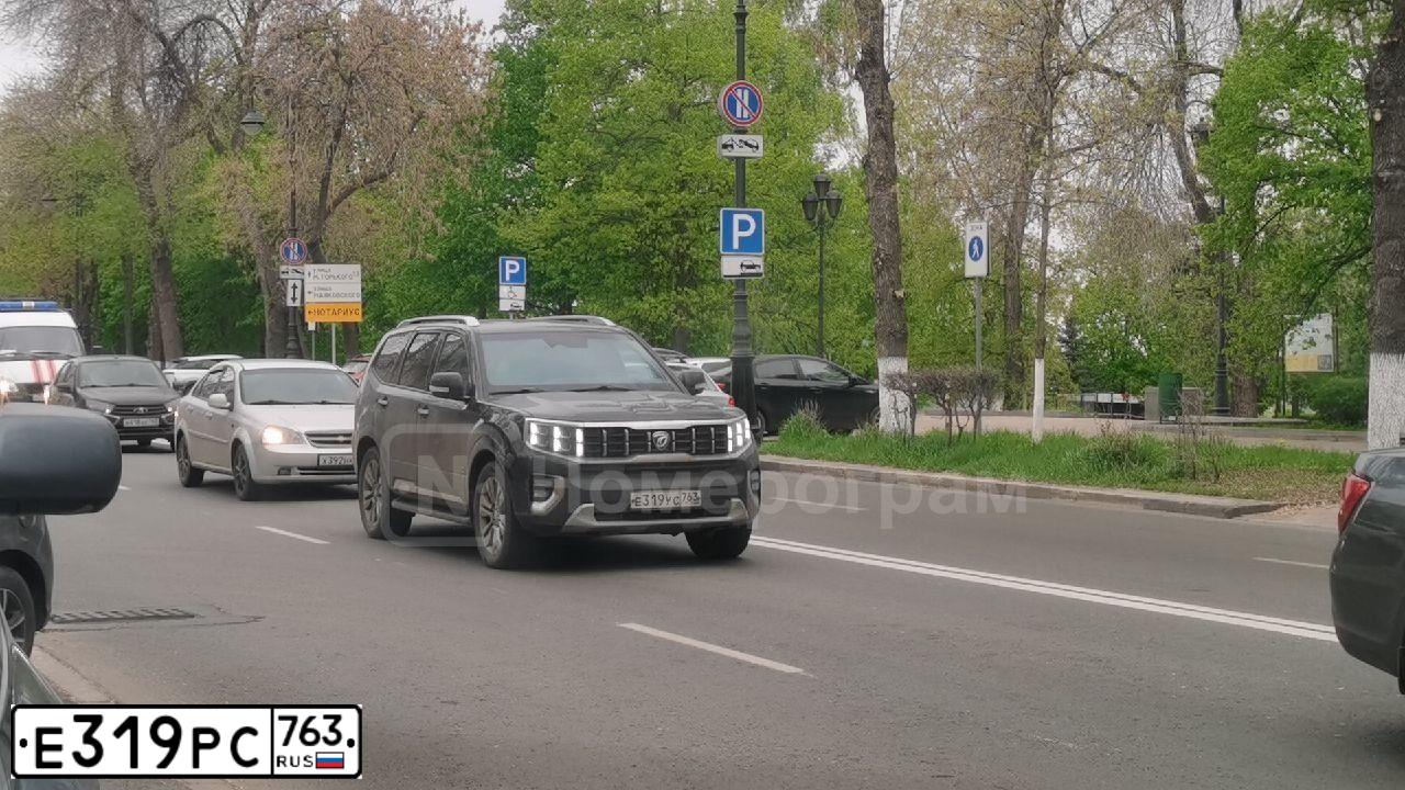 Фото автомобиля MITSUBISHI LANCER, 2007 — госномер Е319РС763. Цвет: ЧЕРНЫЙ