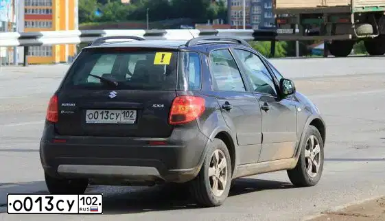 Фото автомобиля SUZUKI SX 4, 2013 — госномер О013СУ102. Цвет: Коричневый
