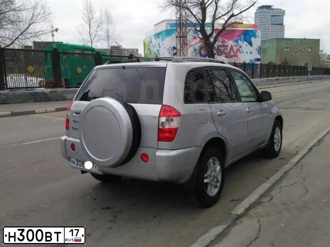 Фото автомобиля MAZDA 3, 2005 — госномер С734НН136. Цвет: КРАСНЫЙ