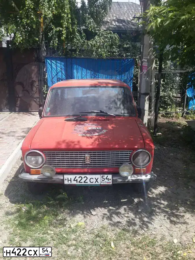 Фото автомобиля LADA 2101, 1982 — госномер Н422СХ54. Цвет: КРАСНЫЙ