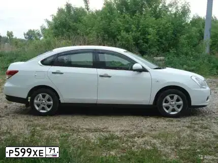 Фото автомобиля NISSAN ALMERA /AVTOVAZ/, 2015 — госномер К529МЕ19. Цвет: БЕЛЫЙ
