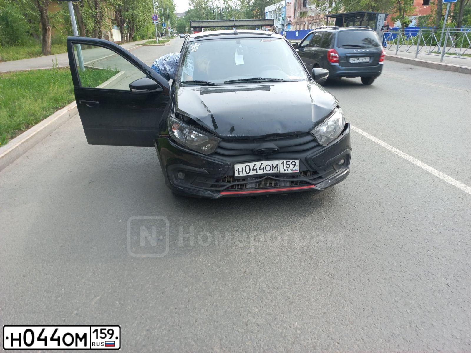 Фото автомобиля LADA 2190 GRANTA, 2020 — госномер Н044ОМ159. Цвет: ЧЕРНЫЙ
