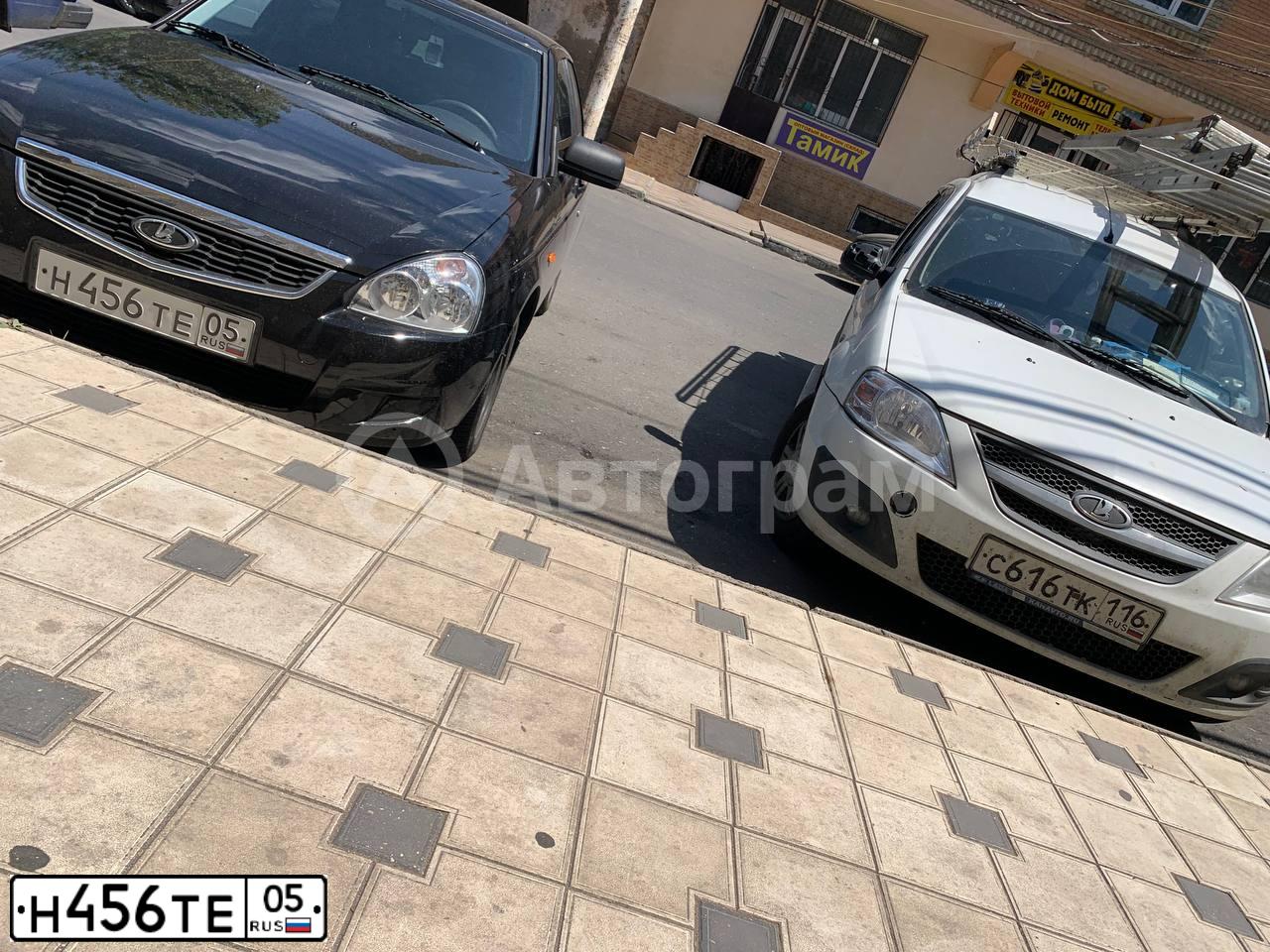 Фото автомобиля LADA 217050 LADA PRIORA, 2015 — госномер Х015АМ05. Цвет: ЧЕРНЫЙ