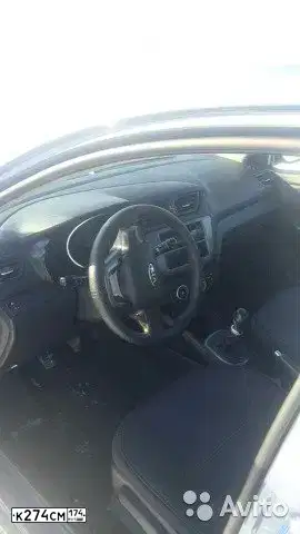 Фото автомобиля KIA RIO, 2013 — госномер К274СМ174. Цвет: ГОЛУБОЙ