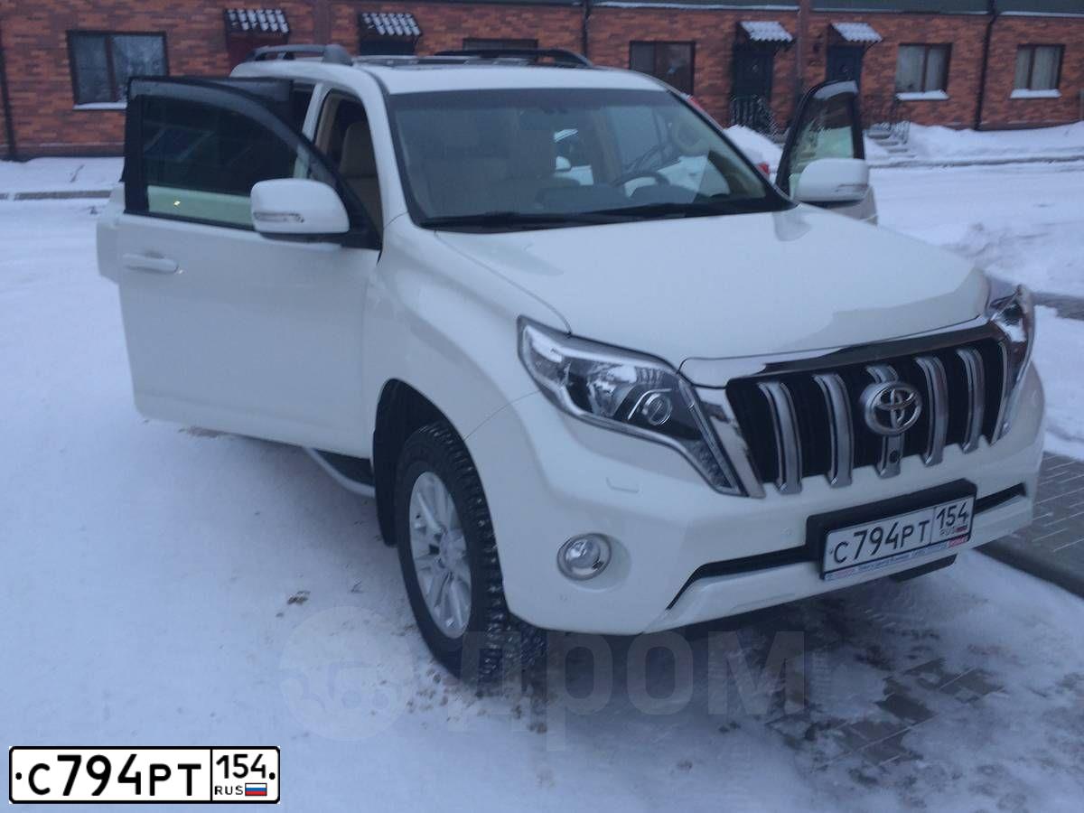 Фото автомобиля TOYOTA LANDCRUISER, 2014 — госномер К032ТК154. Цвет: Белый