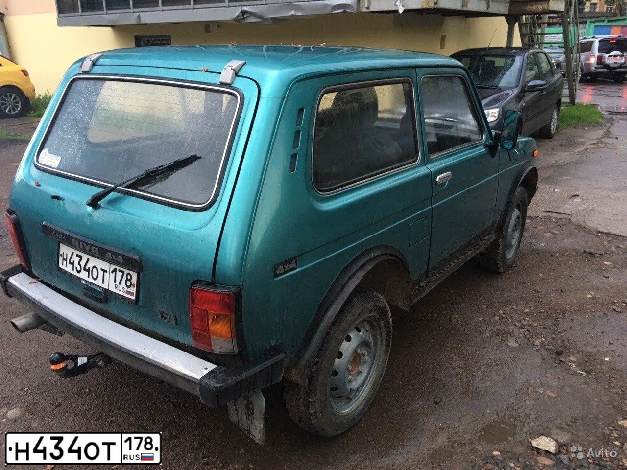 Фото автомобиля LADA 2121 NIVA, 2000 — госномер Н434ОТ178. Цвет: СЕРО-ЗЕЛЕНО-ГОЛУБ.