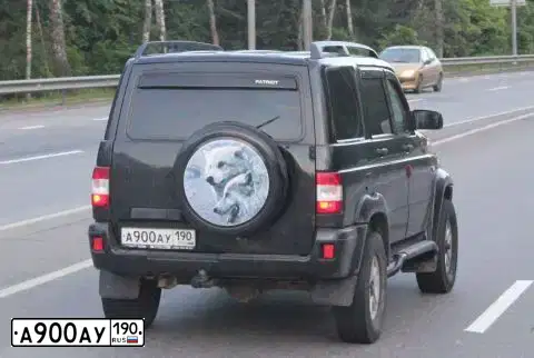 Фото автомобиля UAZ Z 3163 PATRIOT, 2009 — госномер А900АУ190. Цвет: ЧЕРНЫЙ