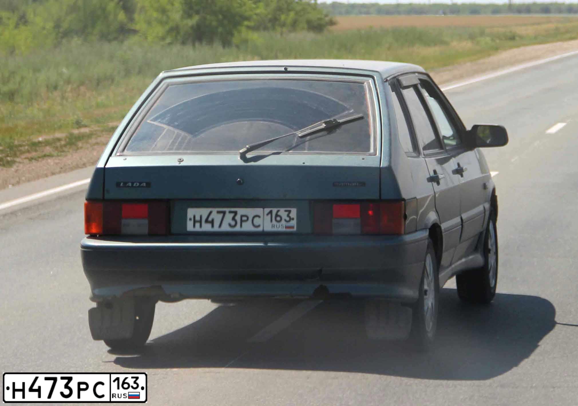 Фото автомобиля LADA 2114 SAMARA, 2007 — госномер Е897КМ164. Цвет: Серо-сине-зеленый