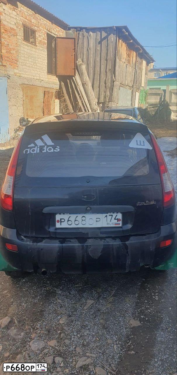Фото автомобиля LADA 1119 KALINA, 2010 — госномер Р668ОР174. Цвет: ЧЕРНЫЙ
