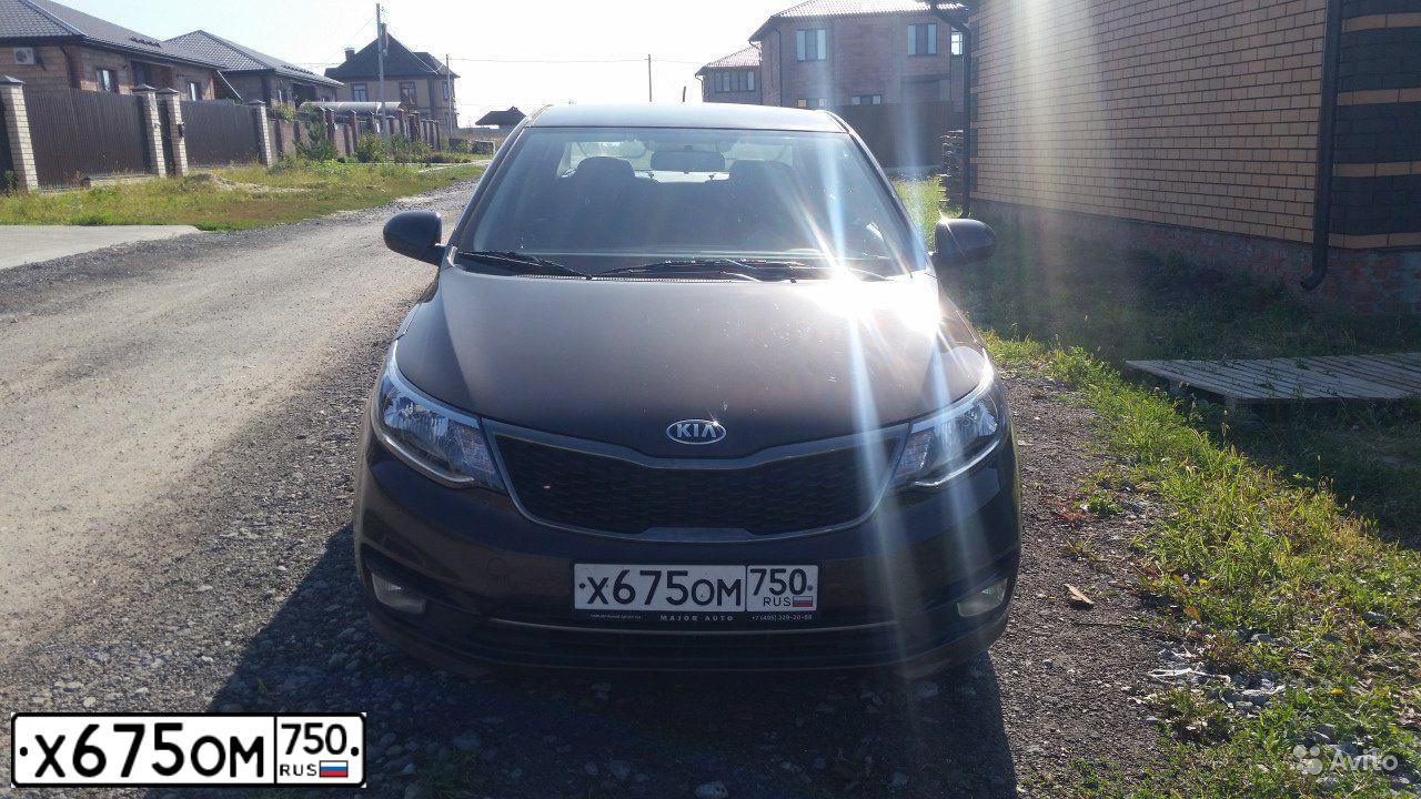 Фото автомобиля KIA RIO, 2017 — госномер Х593ОС31. Цвет: КОРИЧНЕВЫЙ
