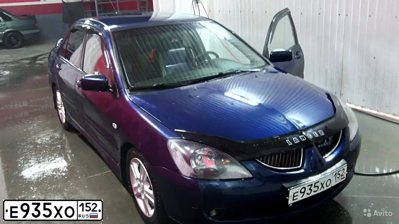 Фото автомобиля MITSUBISHI LANCER, 2004 — госномер Р466ХК11. Цвет: синий