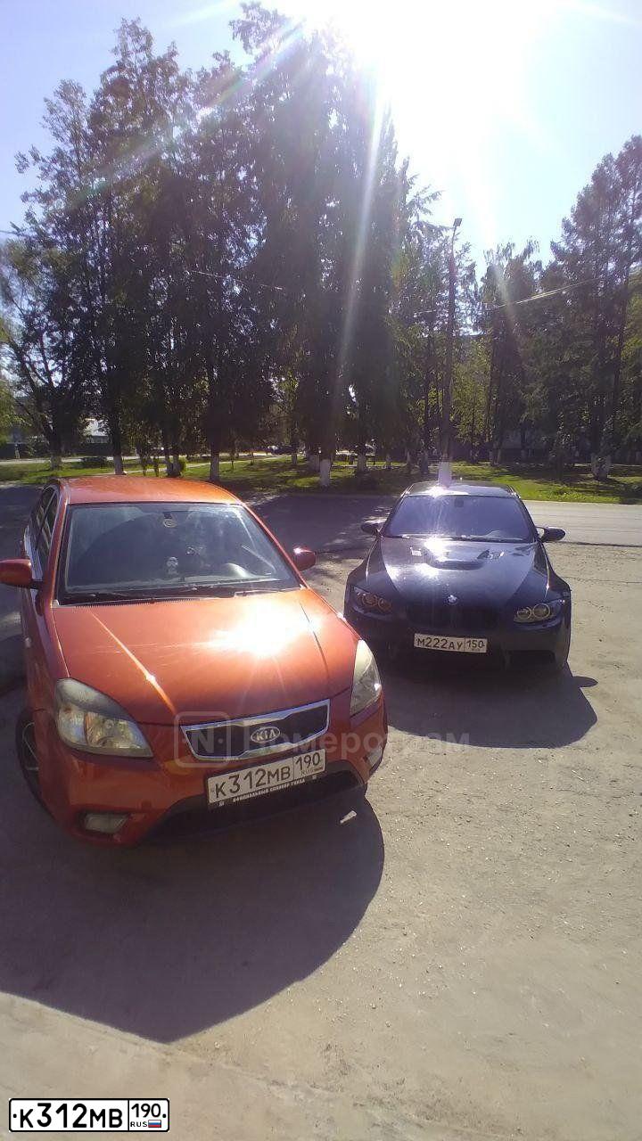 Фото автомобиля KIA RIO, 2010 — госномер К312МВ190. Цвет: КРАСНЫЙ