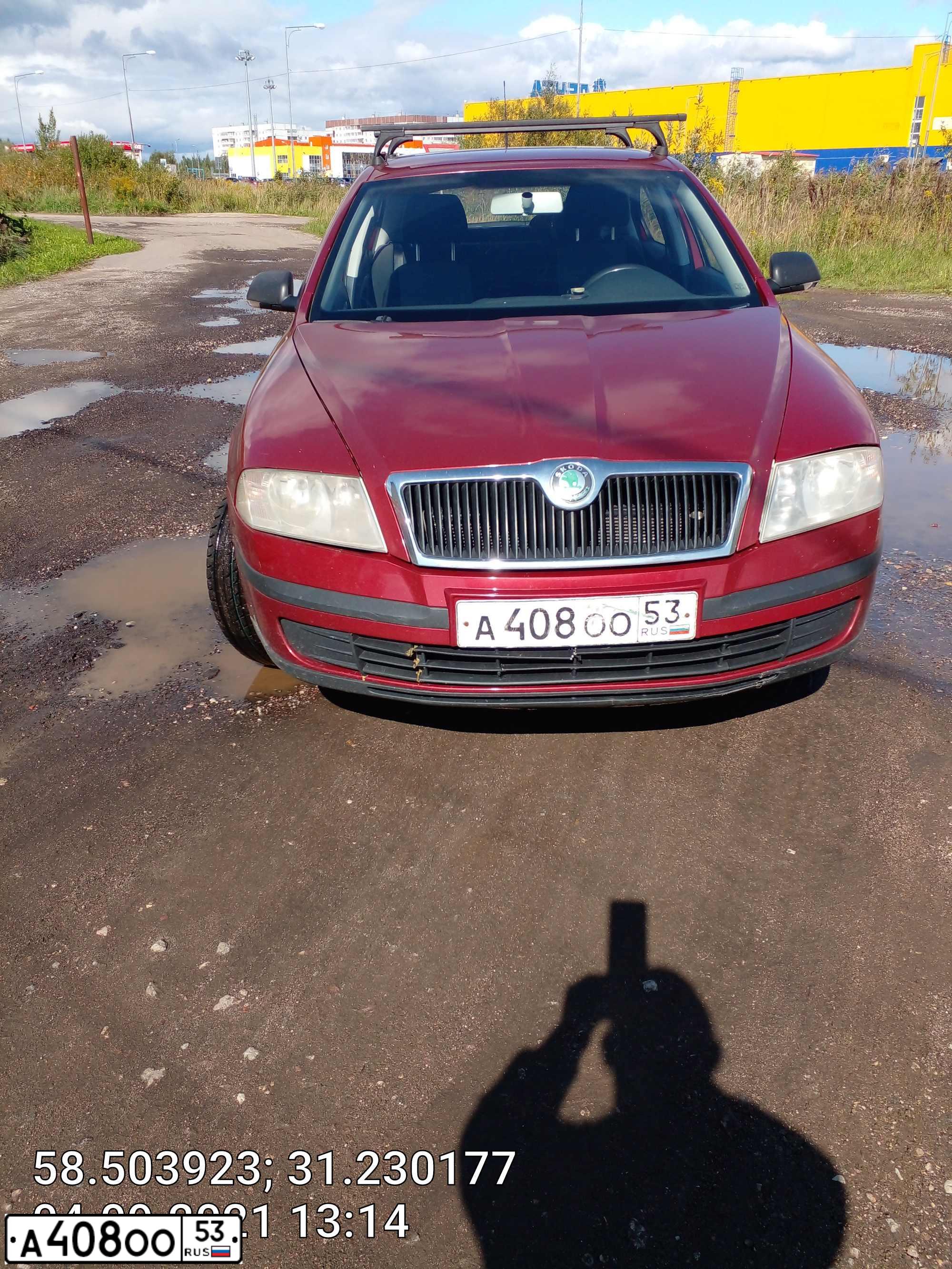 Фото автомобиля SKODA OCTAVIA, 2005 — госномер А408ОО53. Цвет: ВИШНЕВЫЙ