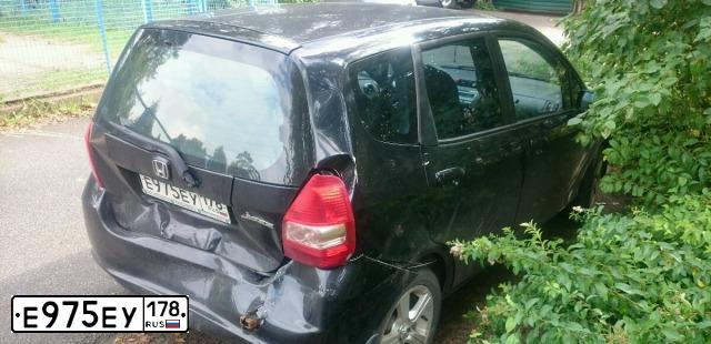Фото автомобиля HONDA JAZZ, 2007 — госномер Е975ЕУ178. Цвет: ЧЕРНЫЙ