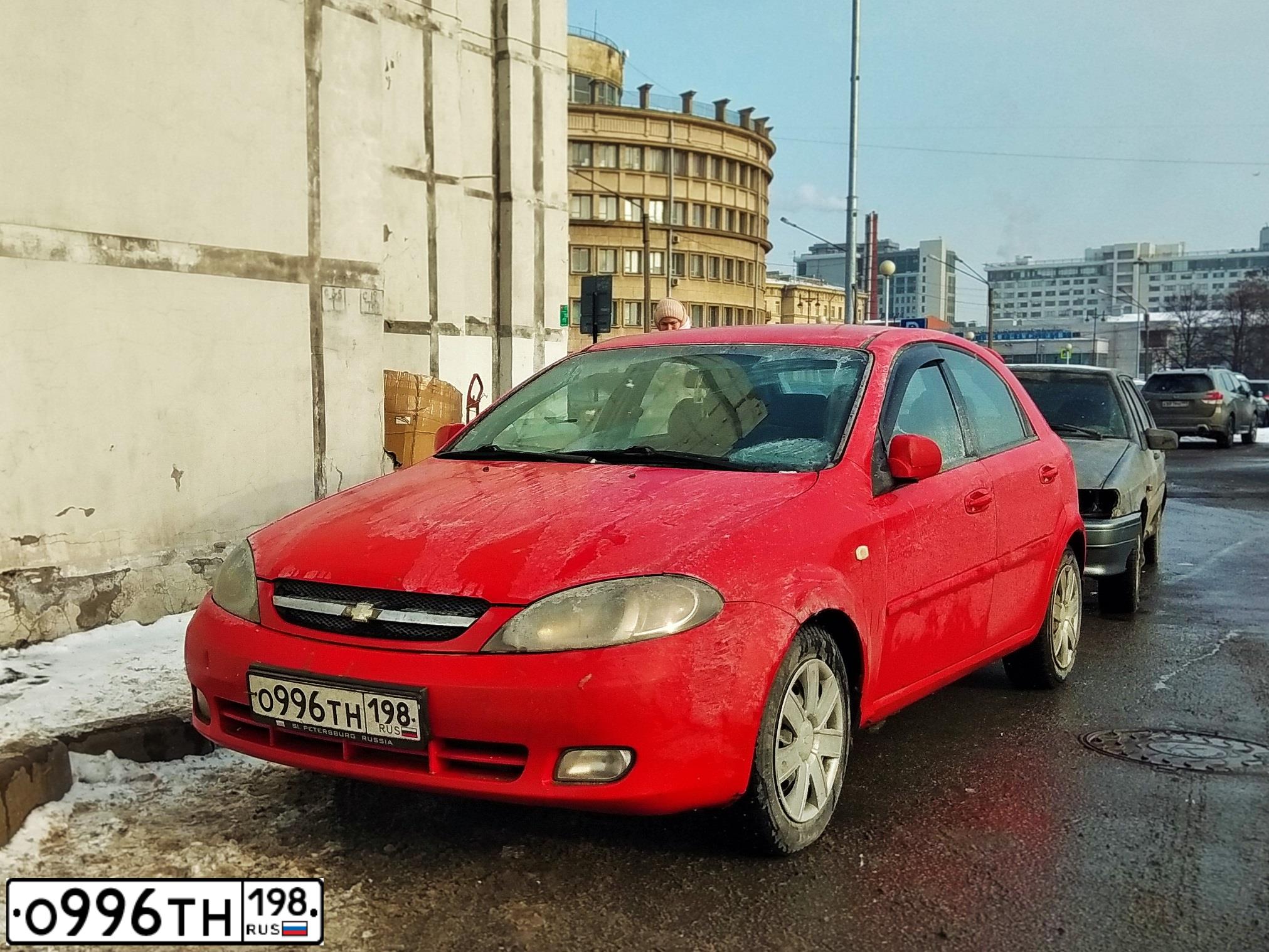 Фото автомобиля CHEVROLET LACETTI, 2007 — госномер О996ТН198. Цвет: Красный