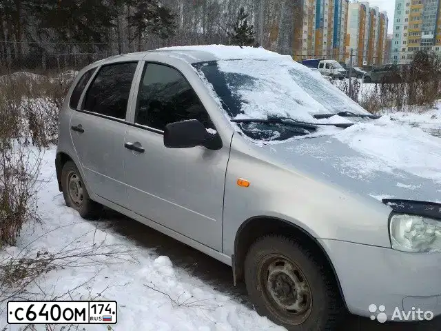 Фото автомобиля LADA KALINA, 2011 — госномер Р218ВР774. Цвет: Серебристый