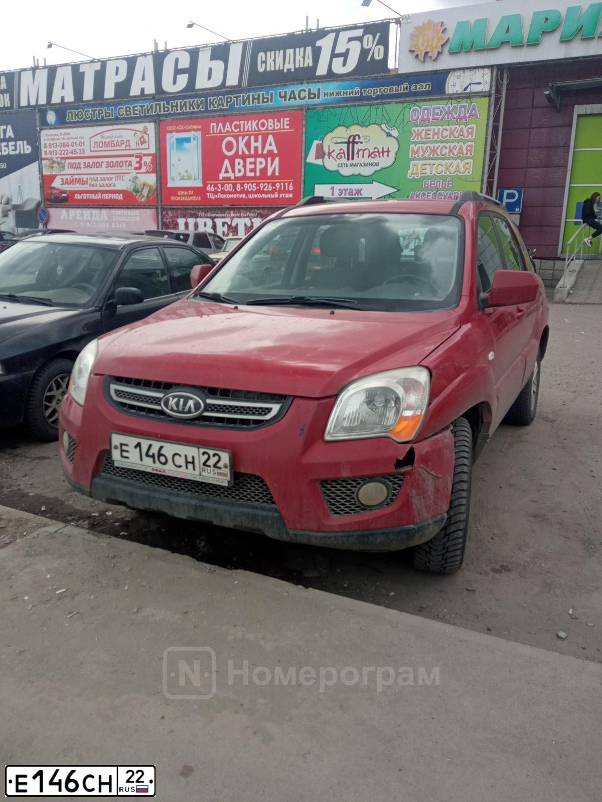 Фото автомобиля KIA SPORTAGE, 2009 — госномер Е146СН22. Цвет: ВИШНЕВЫЙ
