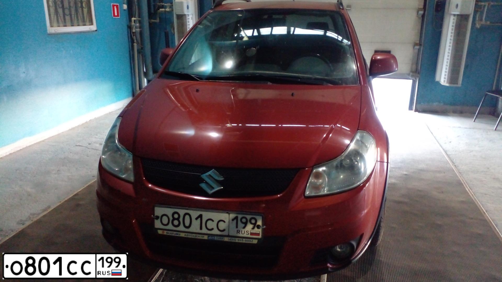 Фото автомобиля SUZUKI SX 4, 2008 — госномер О801СС199. Цвет: ОРАНЖЕВЫЙ