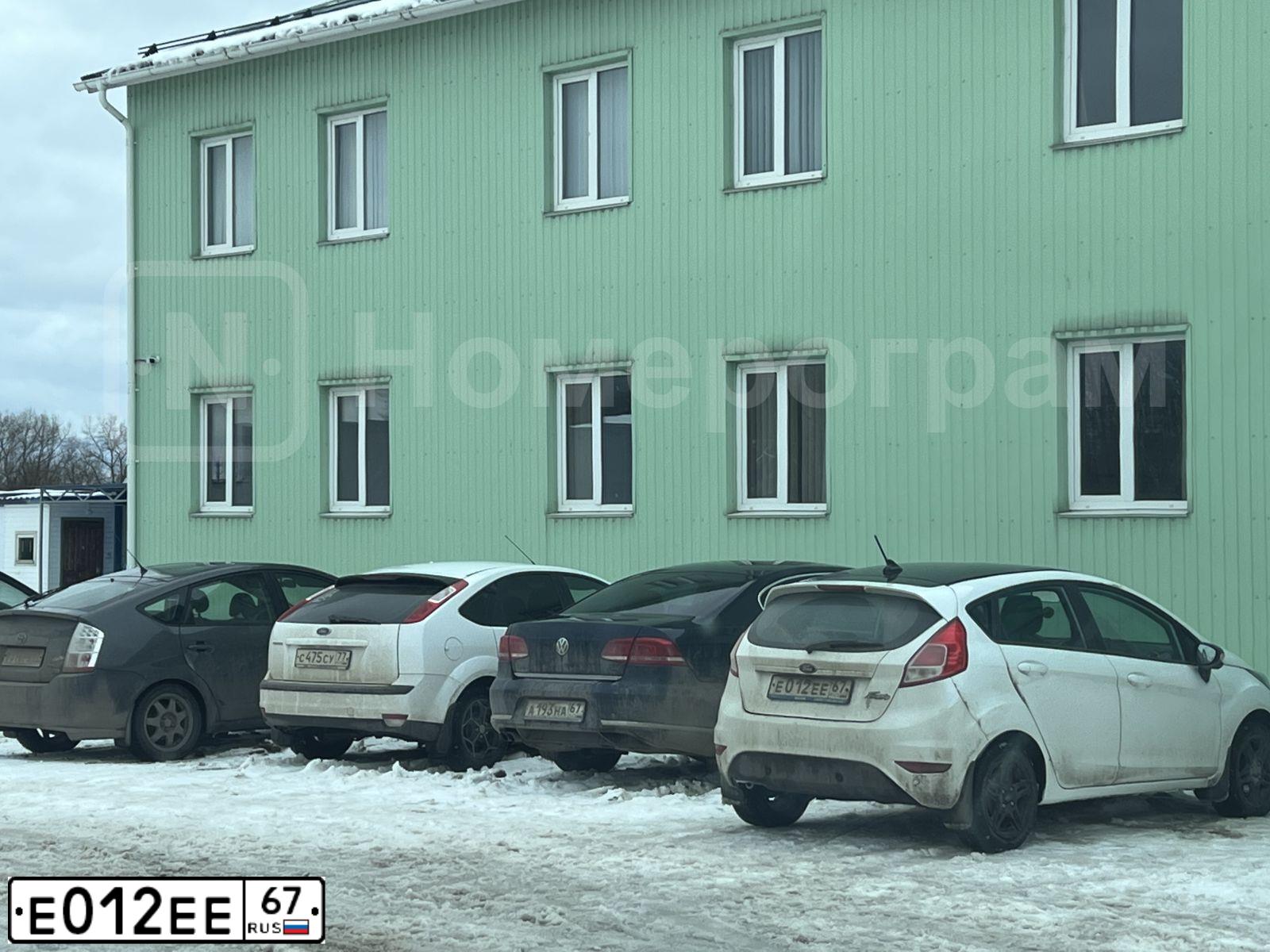 Фото автомобиля TOYOTA RAV4, 2007 — госномер Е012ЕЕ67. Цвет: Красный