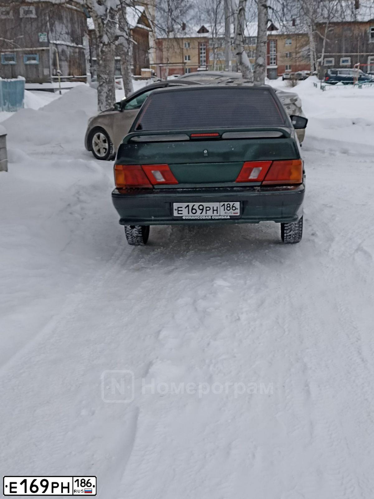 Фото автомобиля LADA 2115 SAMARA, 2004 — госномер Е169РН186. Цвет: Темно-зеленый
