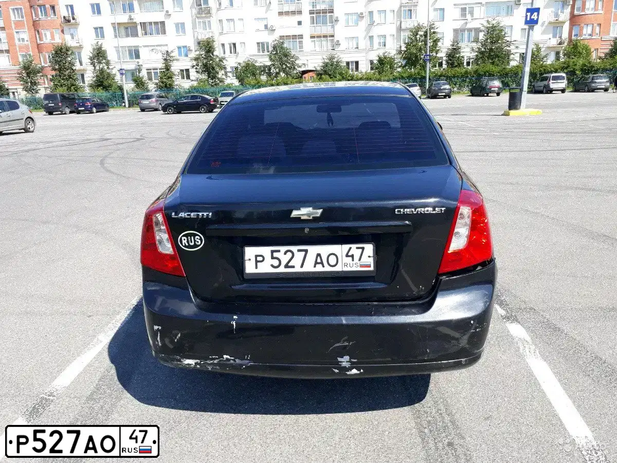 Фото автомобиля CHEVROLET LACETTI, 2008 — госномер Р527АО48. Цвет: ЧЕРНЫЙ