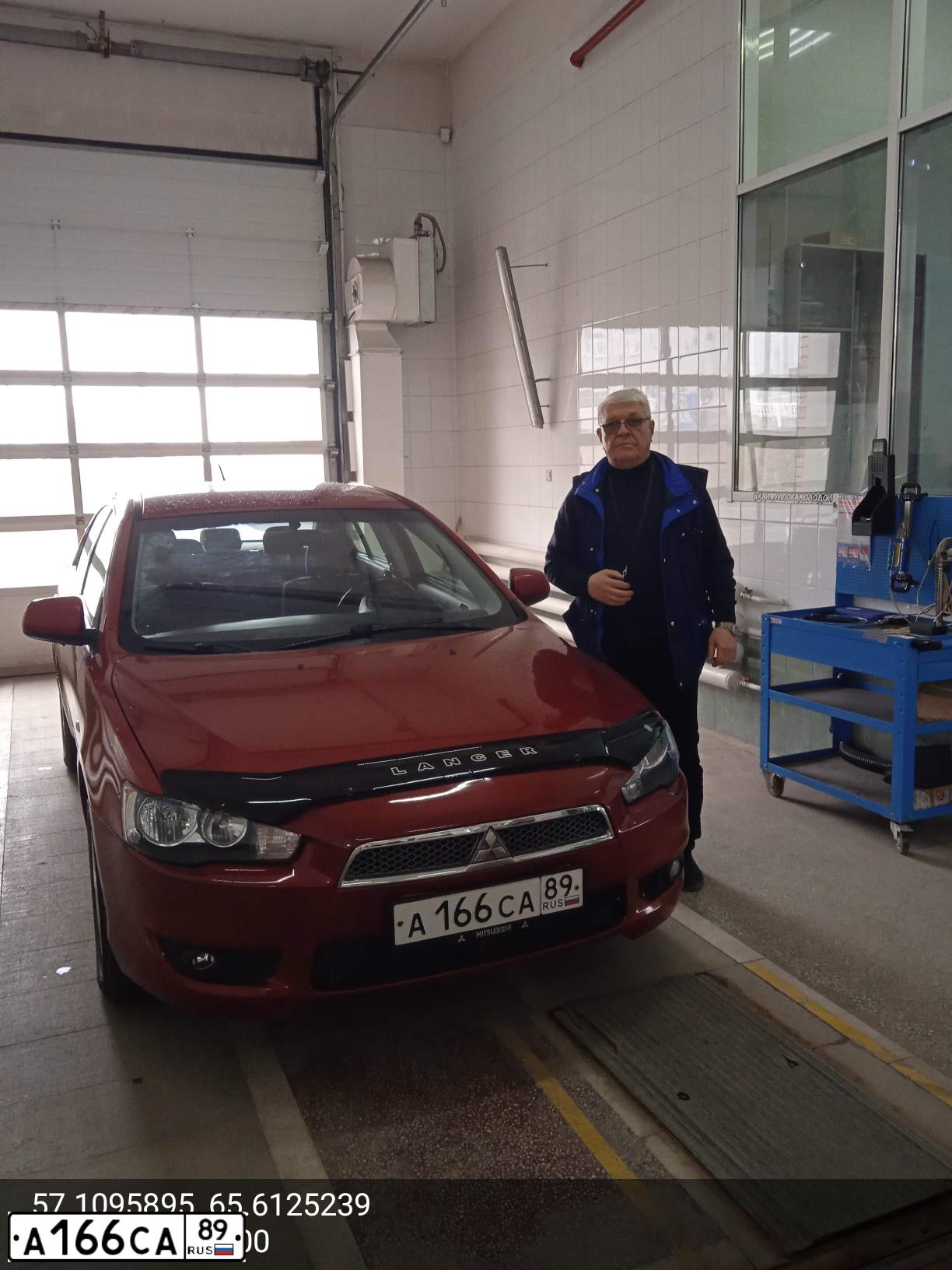Фото автомобиля MITSUBISHI LANCER, 2010 — госномер А692АН172. Цвет: Красный