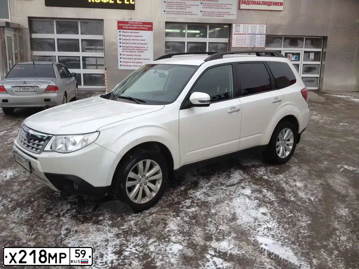 Фото автомобиля MITSUBISHI LANCER, 2005 — госномер Х218МР59. Цвет: СЕРЕБРИСТЫЙ