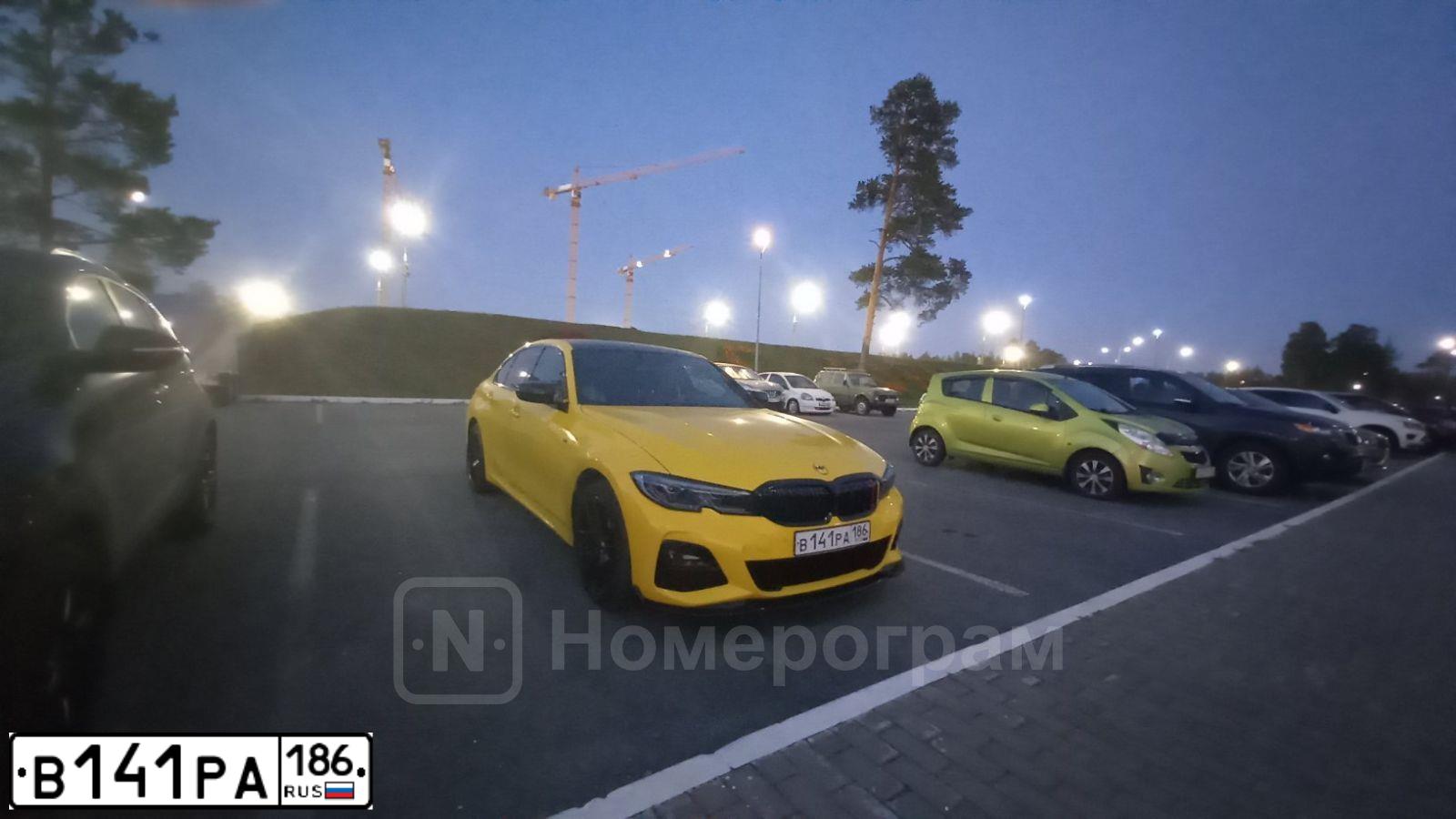 Фото автомобиля BMW SERIE 3, 2020 — госномер В141РА186. Цвет: ЖЕЛТЫЙ ЧЕРНЫЙ