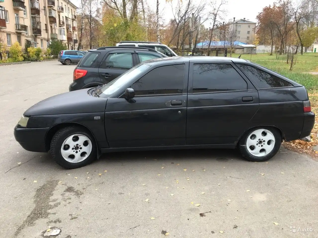 Фото автомобиля LADA 2112, 2006 — госномер Н677ТК35. Цвет: ЗОЛОТИСТЫЙ ТЕМНО-ЗЕЛЕНЫЙ