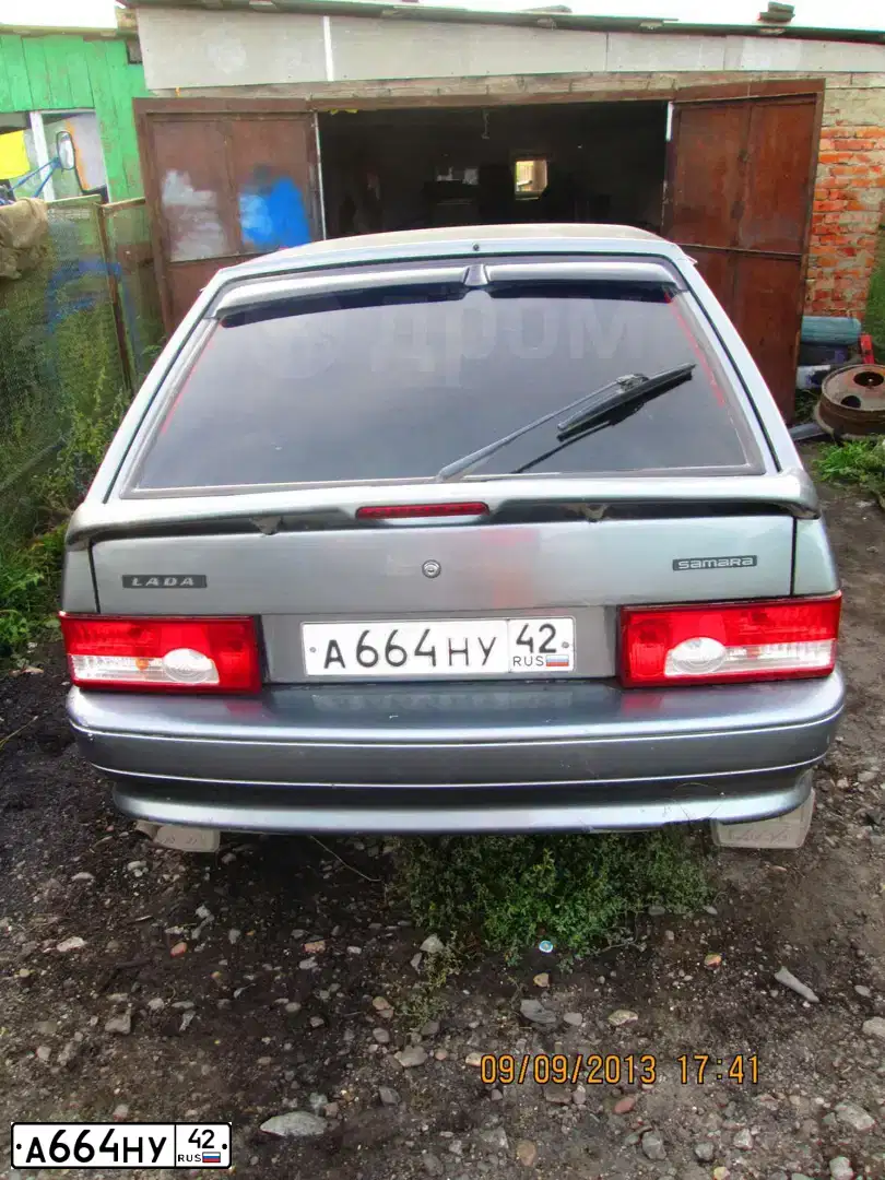 Фото автомобиля LADA 2114 SAMARA, 2005 — госномер А664НУ42. Цвет: средний серо-зеленый металлик
