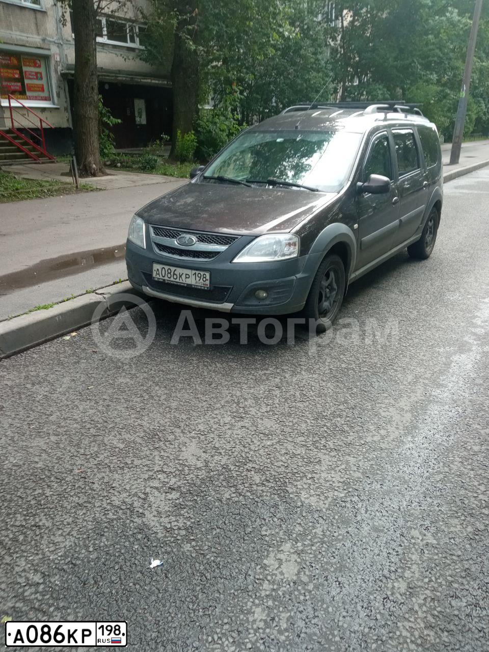 Фото автомобиля LADA LARGUS, 2018 — госномер А086КР198. Цвет: ТЕМНО-КОРИЧНЕВЫЙ