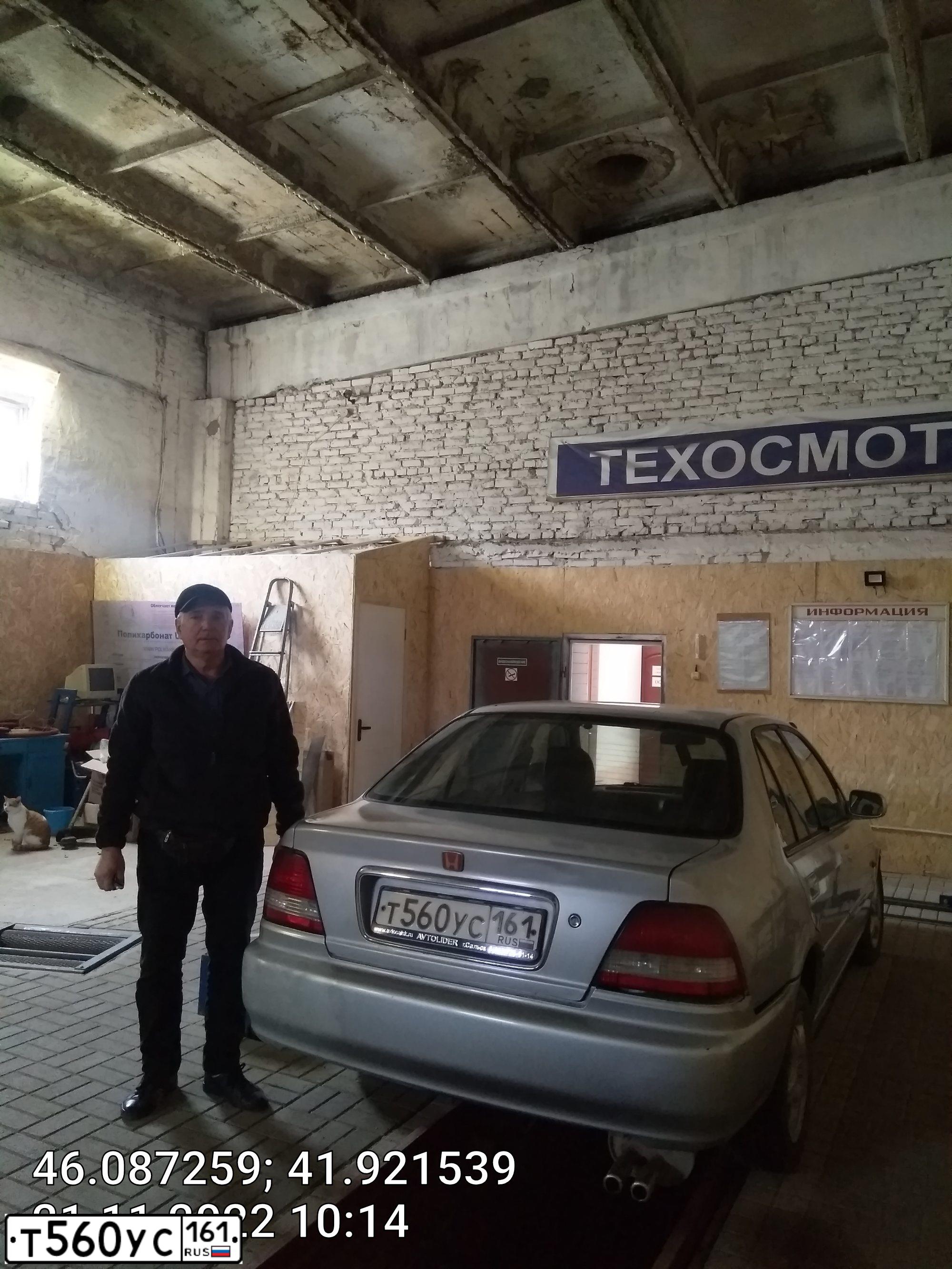 Фото автомобиля HONDA CITY, 2000 — госномер Е696НВ08. Цвет: СЕРЫЙ