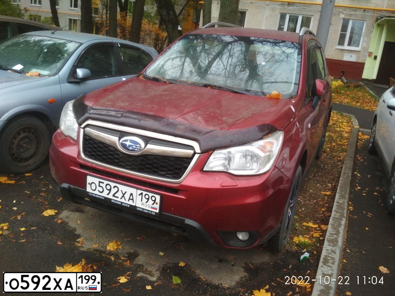 Фото автомобиля SUBARU FORESTER, 2014 — госномер О592ХА199. Цвет: КРАСНЫЙ