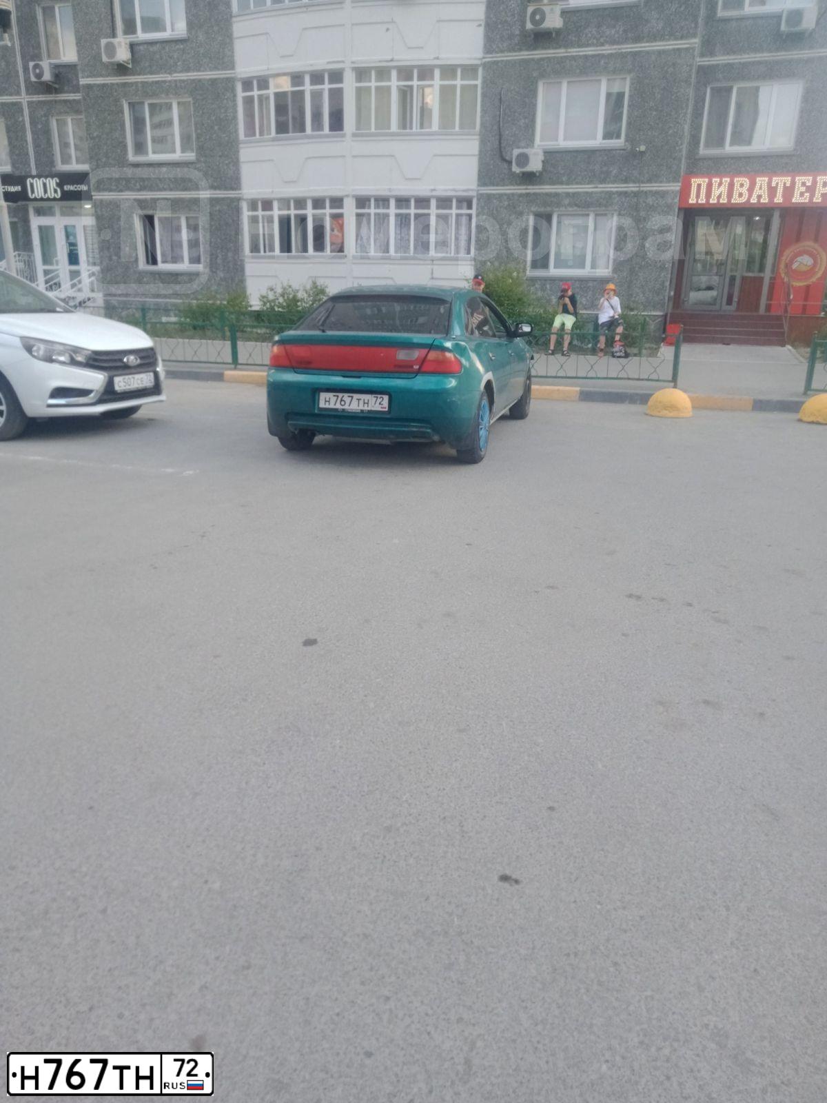 Фото автомобиля MAZDA A 323, 1996 — госномер Р290СТ196. Цвет: ЗЕЛЕНЫЙ