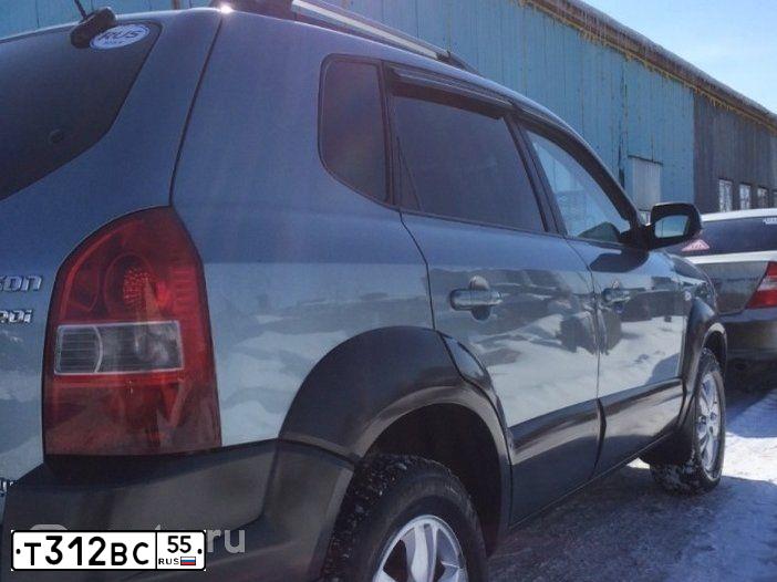 Фото автомобиля HYUNDAI TUCSON, 2008 — госномер В292ТР124. Цвет: СВЕТЛО-ГОЛУБОЙ