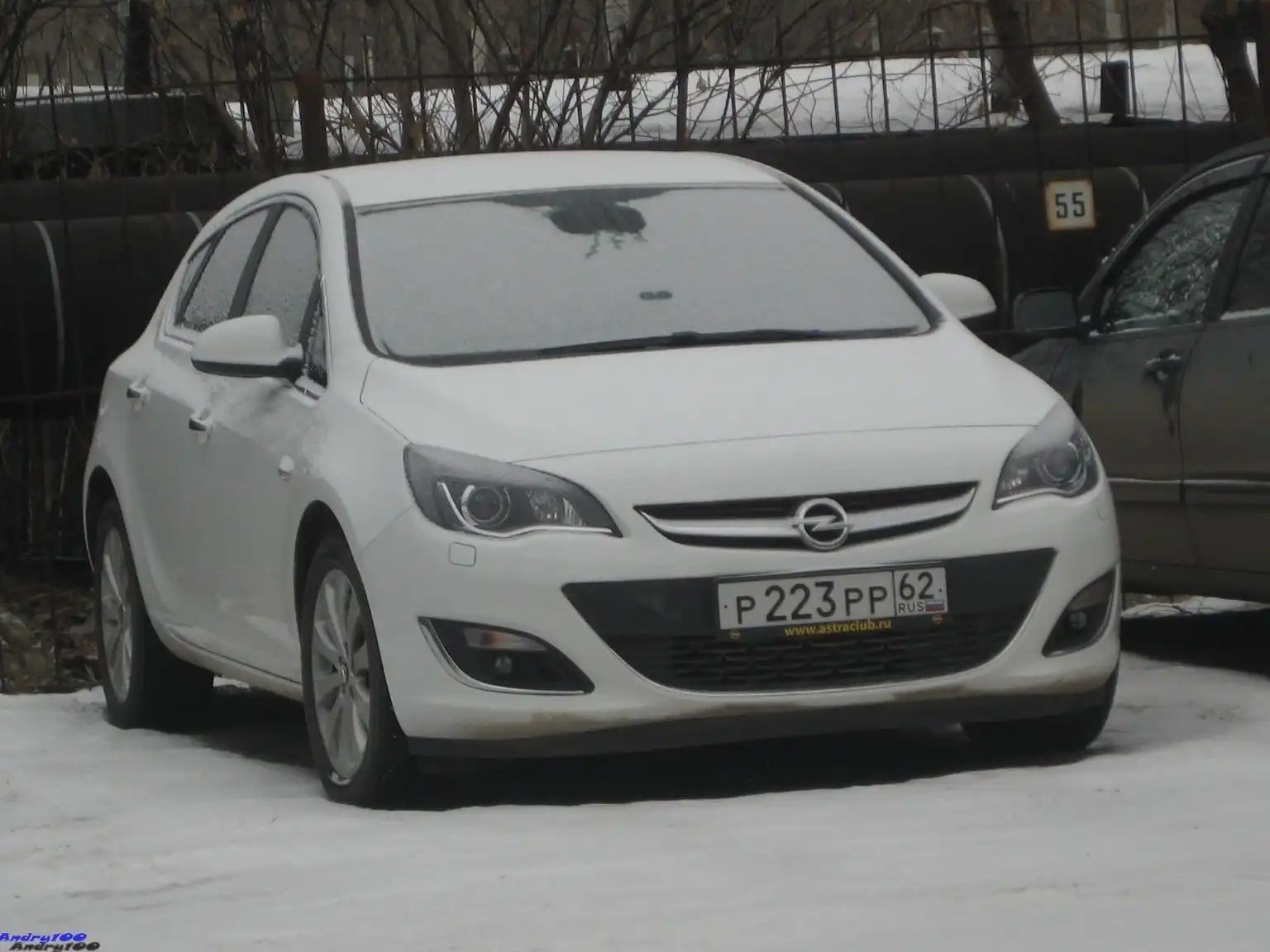 Фото автомобиля OPEL ASTRA, 2012 — госномер Р223РР62. Цвет: Белый